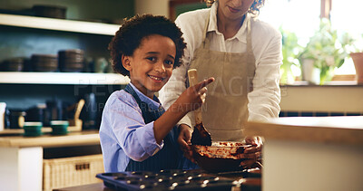 Buy stock photo Baking, portrait and child with mother in kitchen for skill development with chocolate cupcakes. Teaching, bonding and boy kid cooking cookies, muffins or dessert with chef mom together in home.