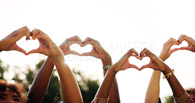 Buy stock photo Friends, people and team with heart hands outdoor for love, care and thank you for charity by sky. Group, support and community with peace gesture for kindness, connection sign or emoji for gratitude