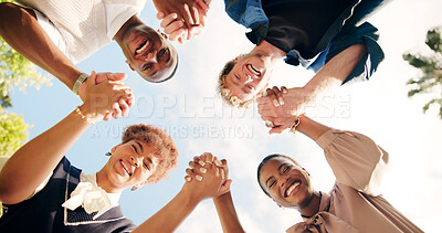 Buy stock photo Friends, portrait and holding hands outdoor for teamwork, synergy or solidarity by sky. Group, face and community of students in circle for cooperation, diversity or happy people below for connection