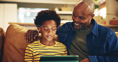 Buy stock photo Bonding, dad and child with tablet, home and elearning with app in living room, teaching and internet. House, man and son with tech for education, growth and development for boy, knowledge and online