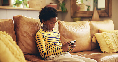 Buy stock photo Couch, boy and black child with phone for games, movies or streaming cartoon weekend in home. Entertainment, relax or kid gaming on sofa with mobile connection for video, playing online or addiction