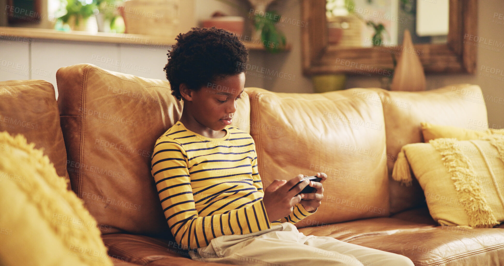 Buy stock photo Couch, boy and black child with phone for games, movies or streaming cartoon weekend in home. Entertainment, relax or kid gaming on sofa with mobile connection for video, playing online or addiction