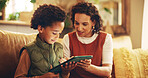 Bonding, mom and son with tablet, home and elearning with app in living room, teaching or internet. House, woman and child with tech for education, growth and development for boy, knowledge or online