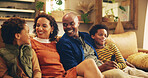 Family, happy and relax on sofa with love, comfort and watching TV on weekend in home. African parents, children and laugh in living room for comedy, relationship development and joking on couch