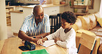 Help, studying and child with dad, notebook and advice for son, growth and development with education. Bonding, black man and assistance for homework, writing knowledge for kid, pointing and home