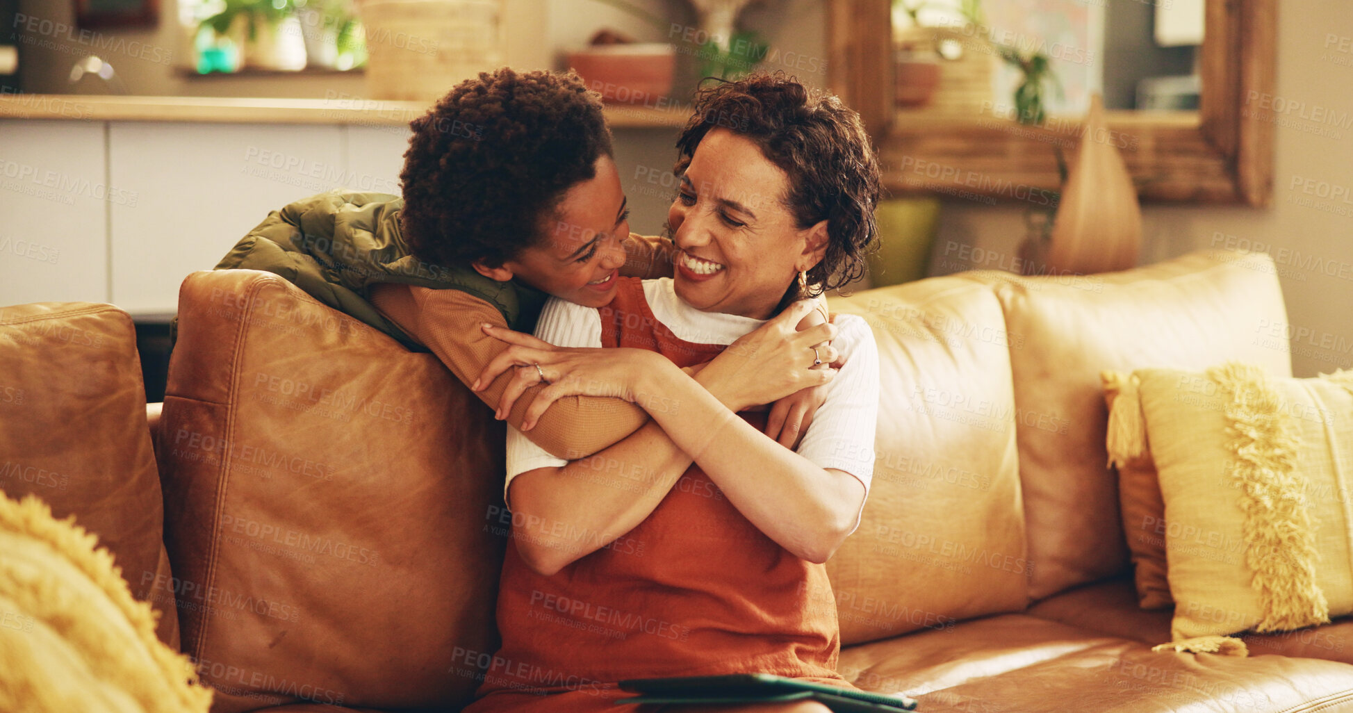 Buy stock photo Happy mom, child and hug with love on sofa for bonding, support or care for holiday together at home. Parent, son or kid with smile for embrace, childhood or enjoying mothers day on couch at house