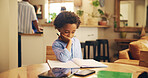 Student, boy and homework with thinking in home for problem solving, learning development and education. Black child, books and studying at dining table for exam knowledge and assignment solution