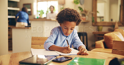 Buy stock photo Writing, serious and child with notebook, home and boy with info, education and studying for exam. Desk, growth and development of African kid, knowledge and preparing for test with homework in house