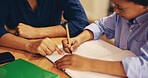 Mother, child and hands at books for writing, education and help with math homework in home. Woman, kid and learning at table with explaining, advice and homeschooling for knowledge development