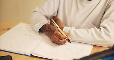 Buy stock photo Hands, writing and child with notebook, desk and education for student, growth and development in school. Table, pupil and kid with assessment, closeup and youth with scholarship in classroom