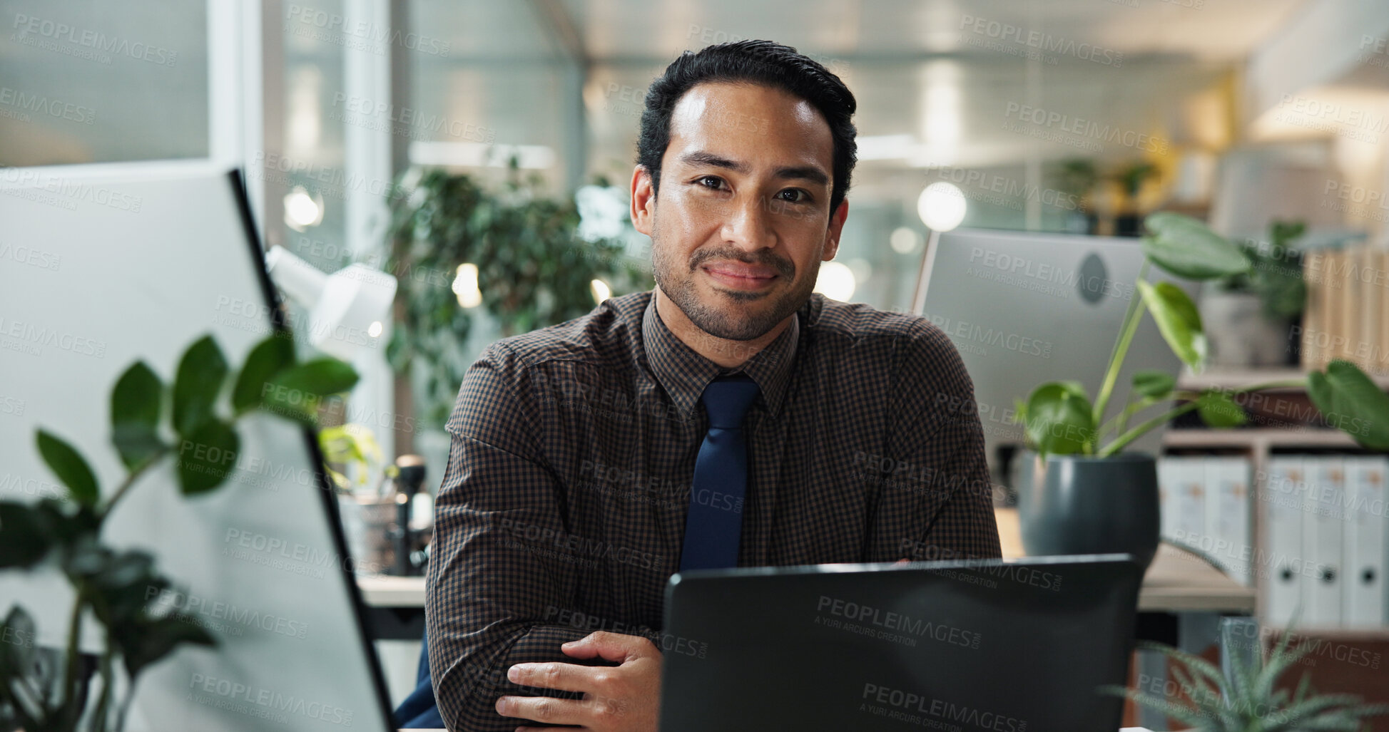 Buy stock photo Businessman, portrait and pride with smile, laptop and office for bookkeeping as accountant. Male person, night and technology as finance agency, banking and investment opportunity for payroll in job