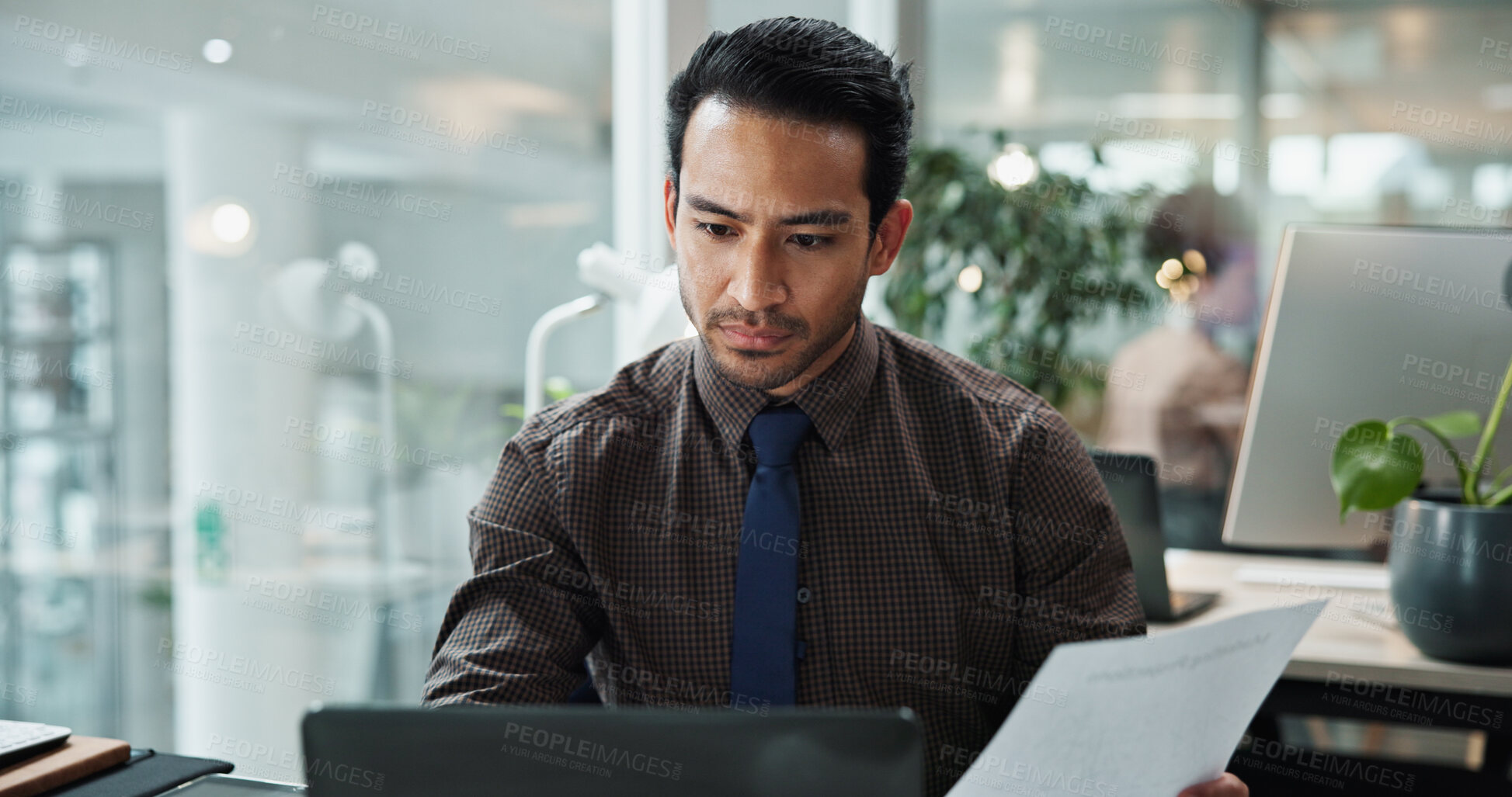 Buy stock photo Business, man and documents with laptop in office for data entry in CRM system and online sales report. Account representative, employee and serious with client information update or portfolio review