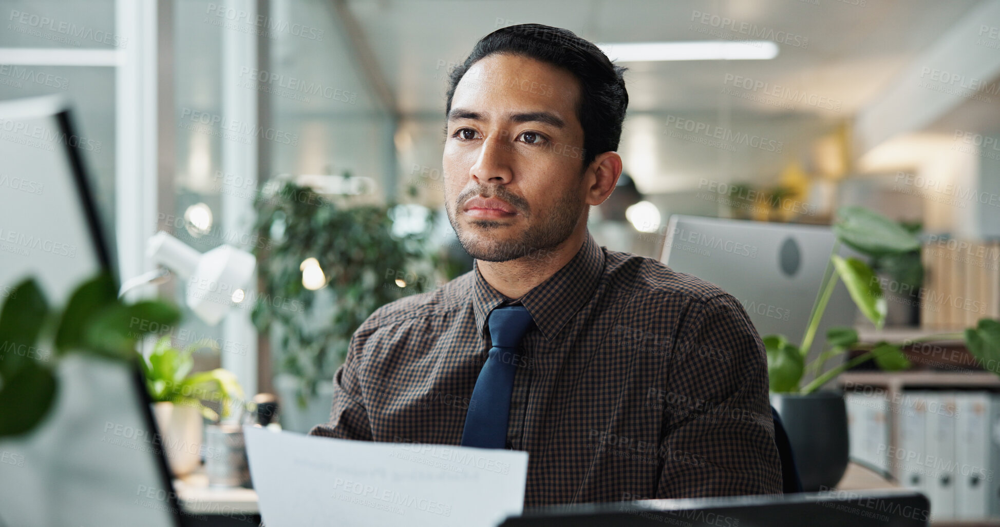 Buy stock photo Business, man and paperwork with laptop in office for data entry in CRM system and online sales report. Account representative, employee and serious with client information update or portfolio review