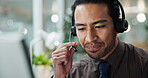 Asian man, call center or talking in office with mic at law firm with headphones, computer or justice advice. Legal consultant, face or customer support with dispute resolution service at help desk