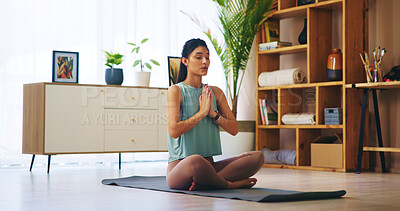 Buy stock photo Prayer hands, meditation and woman in morning routine for calm, relax or spiritual practice in home. Female person, yoga pose and zen on exercise mat with balance, peace or wellness for mental health