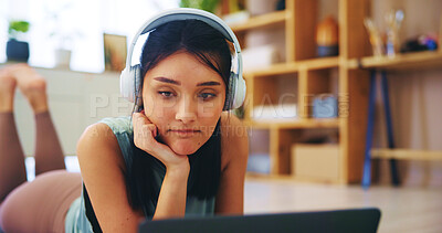 Buy stock photo Headphones, laptop and yoga with woman in living room for streaming service, online class and fitness. Social media, pilates and subscribe with person watching at home for health, audio and tutorial