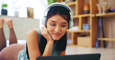 Buy stock photo Online class, laptop and yoga with woman in living room for streaming service, headphones and fitness. Social media, pilates and subscribe with person watching at home for health, audio and tutorial