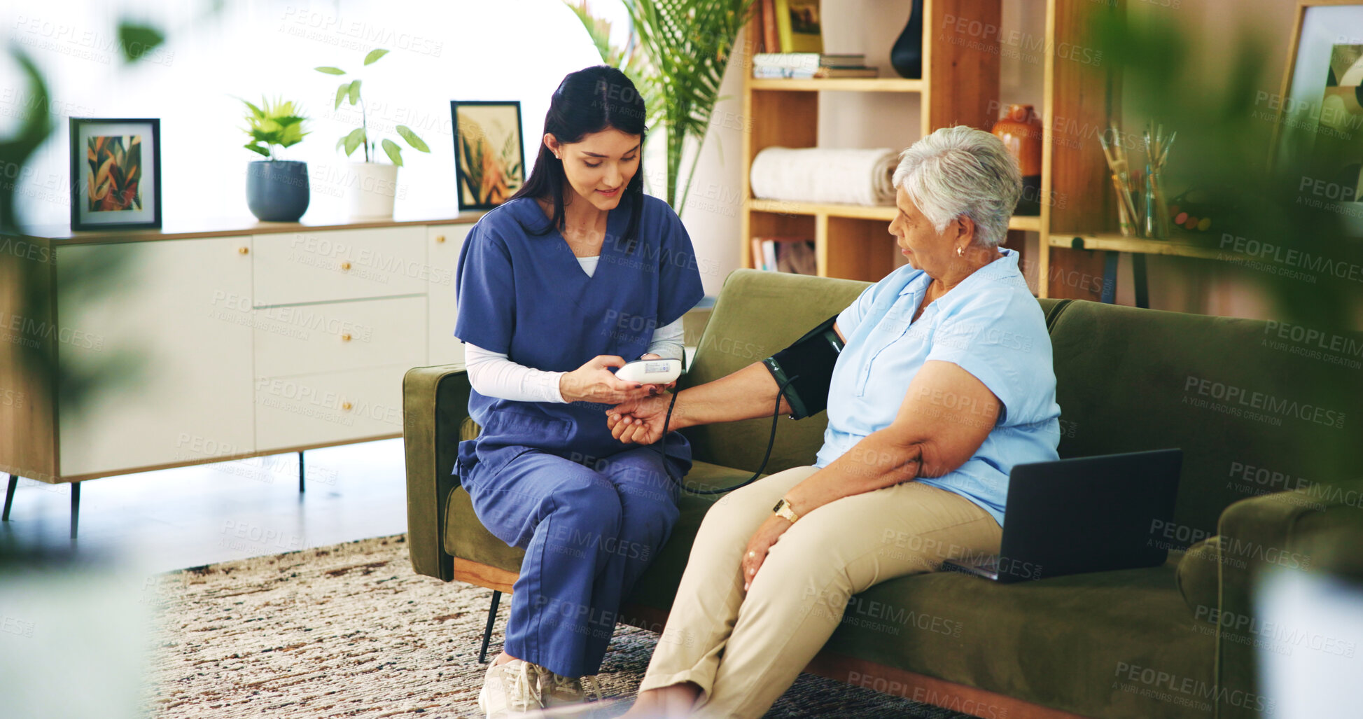 Buy stock photo Senior woman, nurse and blood pressure test on sofa for cardiovascular health, heart rate and checkup. Professional, elderly patient and machine in home to monitor hypertension and medical support