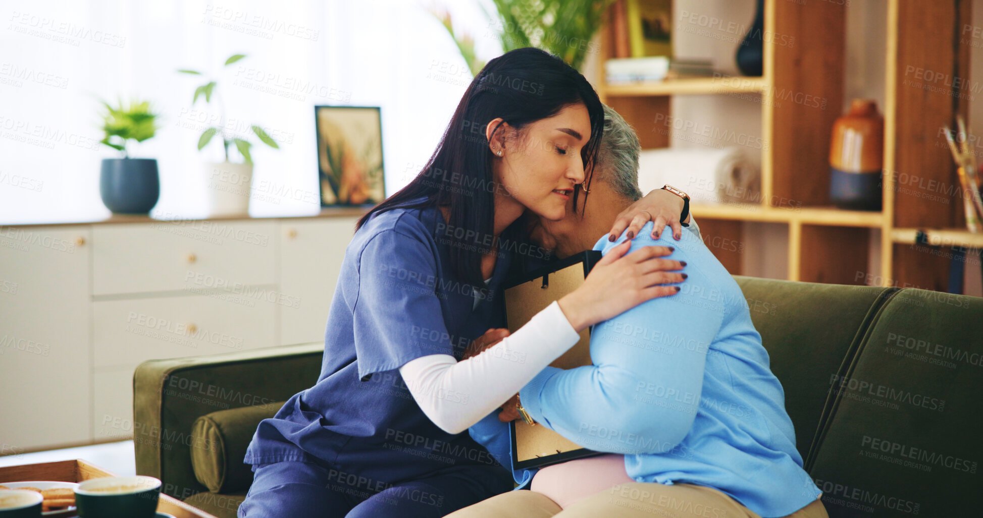 Buy stock photo Picture, hug and old woman on sofa with nurse for senior care, support and grief counseling at home. Homecare, elderly widow and caregiver embrace on couch with memory, bonding and comfort in loss