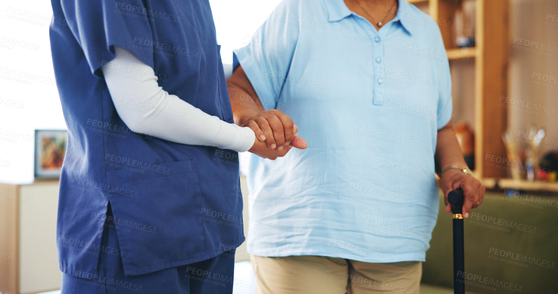 Buy stock photo Elderly woman, nurse and holding hands for help with mobility, assisted living or care in home. Senior person with disability, caregiver and support in retirement for rehabilitation, service or trust