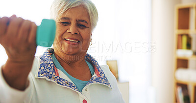 Buy stock photo Dumbbell, fitness and smile with old woman in living room for health, retirement and weightlifting. Wellness, happiness and exercise with senior person and weights at home gym for workout and muscle