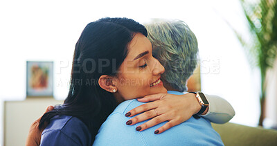 Buy stock photo Caregiver, hug and senior woman on sofa with smile for support, kindness and empathy in retirement. People, embrace and elderly patient with care, solidarity and together in lounge at nursing home