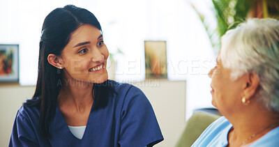 Buy stock photo Smile, conversation and old woman on sofa with nurse for senior care, support and trust in lounge at home. Homecare, elderly person and caregiver on couch with healthcare advice, bonding and comfort