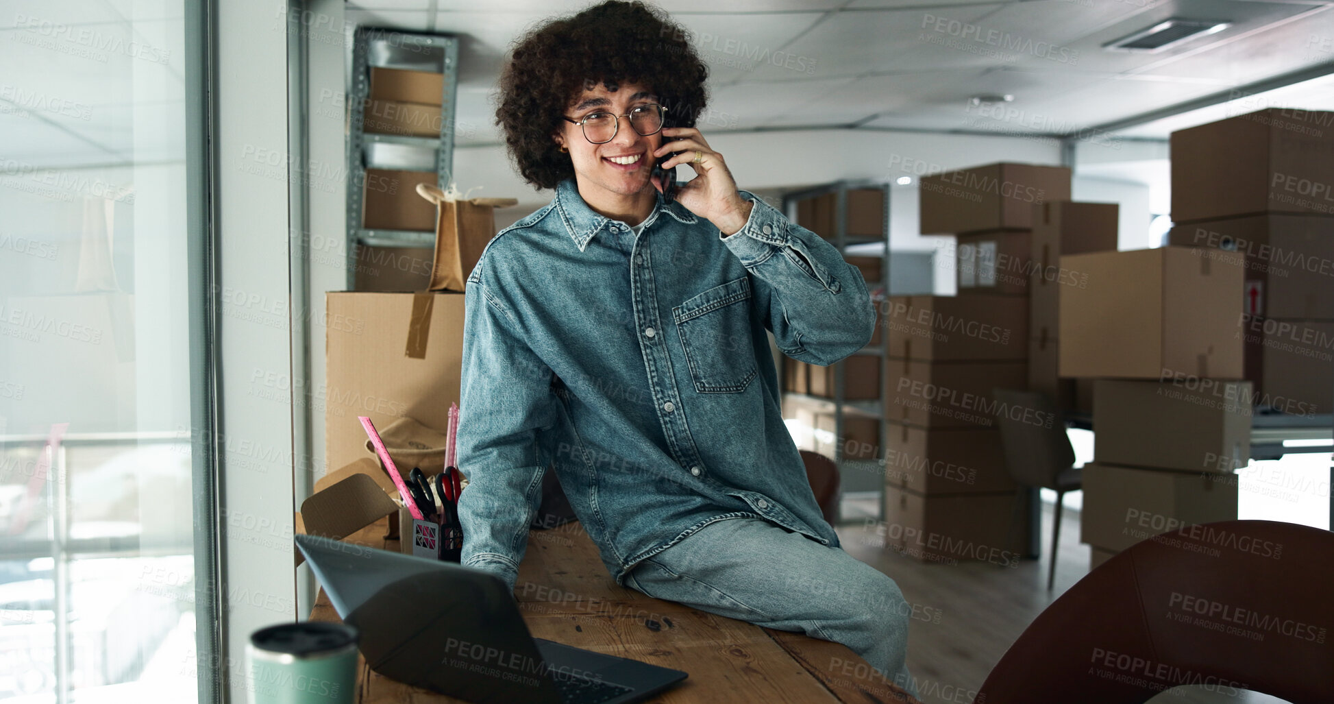 Buy stock photo Phone call, delivery and man on laptop with boxes for shipping, online orders and ecommerce. Business, startup and person talking for client package, distribution or supply chain logistics in factory
