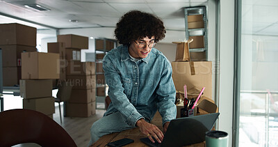 Buy stock photo Man, laptop or typing in office for logistics, order process or package tracking in business. Entrepreneur, tech or smile in warehouse for inventory management, supply chain or boxes for season rush
