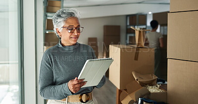 Buy stock photo Woman, tablet and smile in business for logistics, package tracking or checklist at window. Mature entrepreneur, tech and app in warehouse for inventory management, supply chain or boxes for delivery