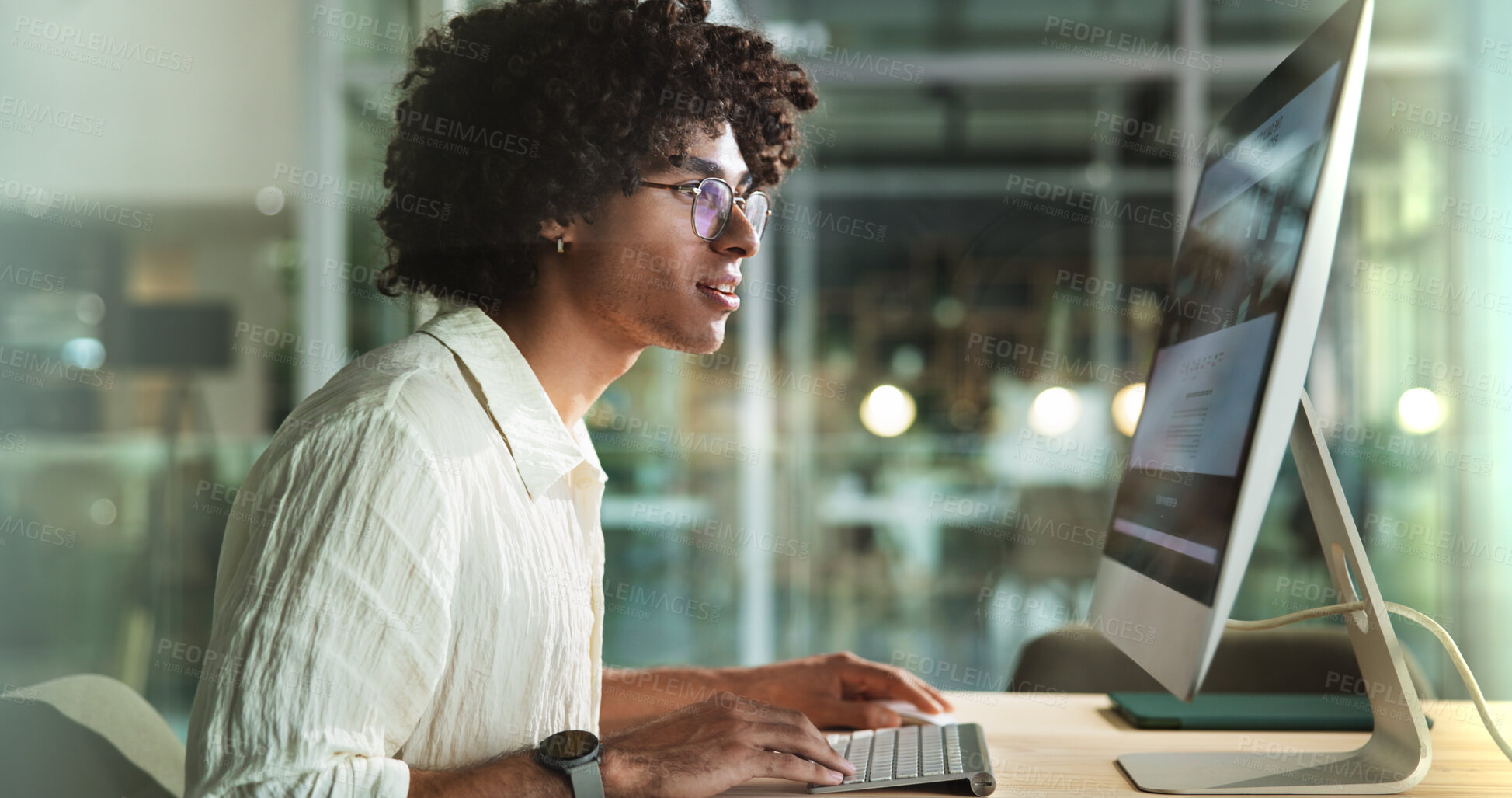 Buy stock photo Computer, typing and creative business man in office for story, article or content writing. Technology, startup and worker check email for social media platform, blog and project on overtime at night