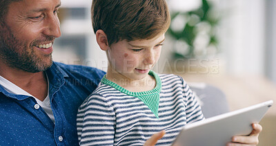 Buy stock photo Relax, dad or child with smile or tablet in home for connectivity, bonding or streaming online for ebook. Happy family, father and boy with technology, movies or cartoon for learning or playing games