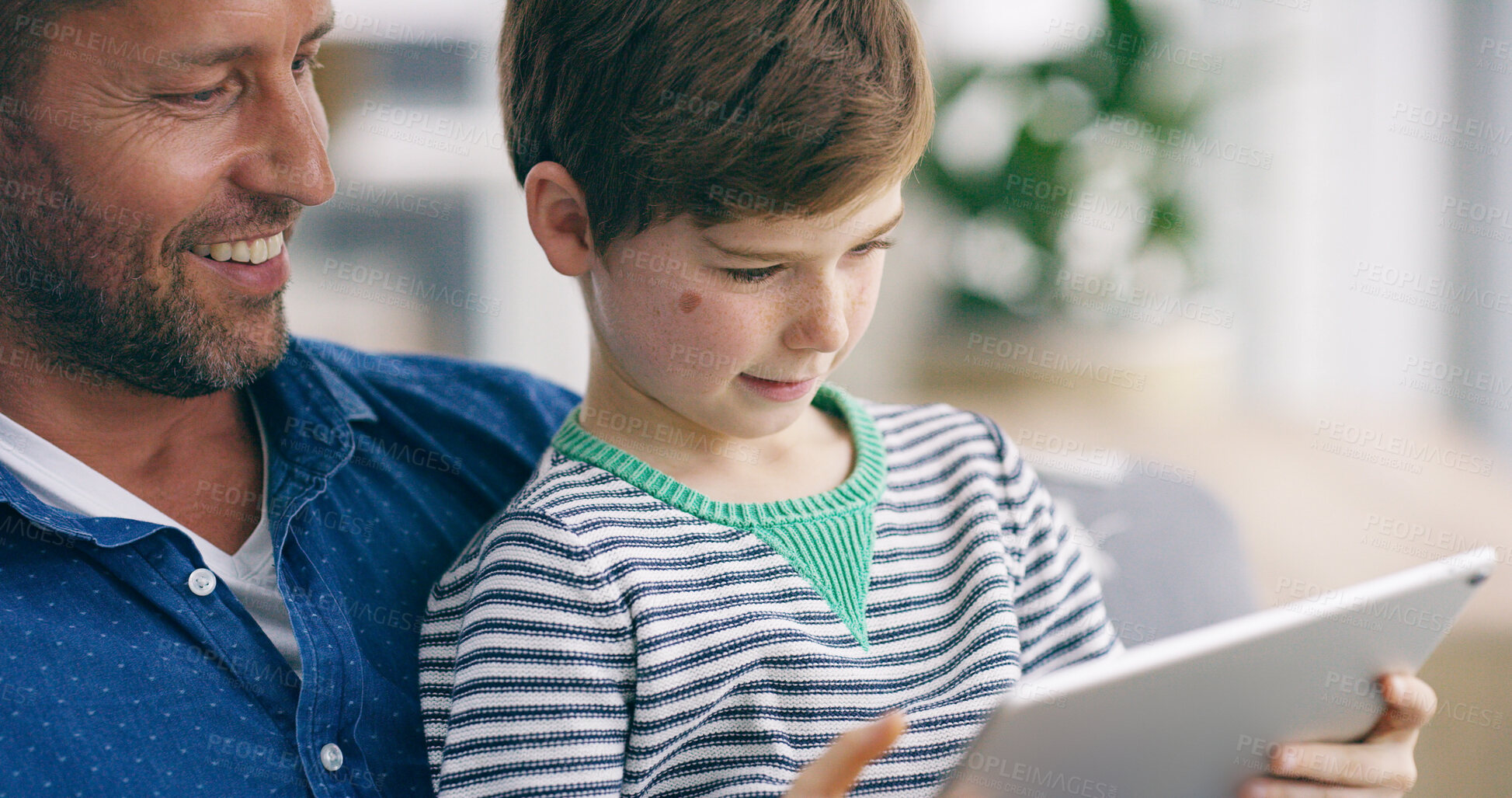 Buy stock photo Relax, dad or child with smile or tablet in home for connectivity, bonding or streaming online for ebook. Happy family, father and boy with technology, movies or cartoon for learning or playing games