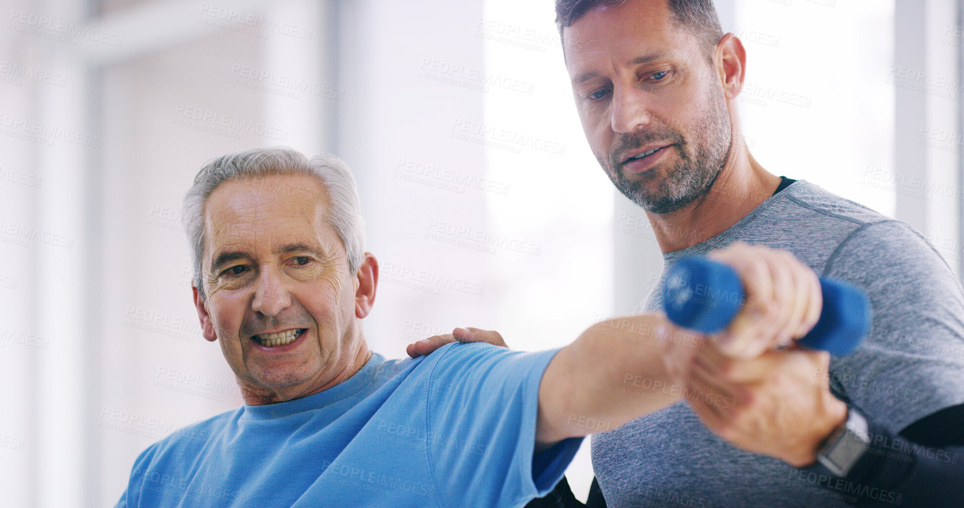 Buy stock photo Elderly person, physiotherapy and man in office for help, therapy and arm exercise for healing. Senior patient, chiropractor and weight in practice for muscle care, strengthen shoulder and healthcare