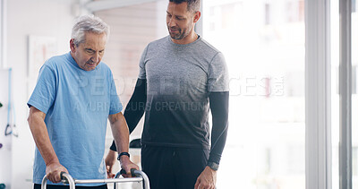 Buy stock photo Physiotherapist, elderly patient and support with walker for mobility, physical activity or progress at clinic. Male person, medical worker or senior with physiotherapy for help or aid at hospital