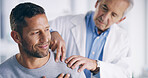 Man, doctor or shoulder pain with injury for muscle tension, relief or checkup at hospital. Mature, male person or medical professional with client for ache, inflammation or healthcare exam at clinic