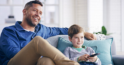 Buy stock photo Father, boy and watching tv with remote on sofa, relax and smile in living room at family house. Dad, child and happy together on couch for streaming, video and cartoon movies with bonding in home