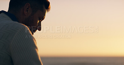 Buy stock photo Man, thinking and reflection at beach, sunset and promenade for memory with mock up space in evening. Person, pier and grief by sea, ocean and outdoor with sky, horizon and loss in New Zealand