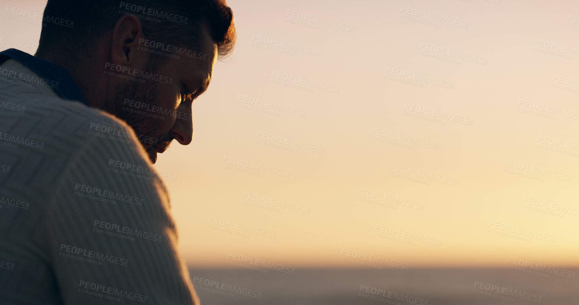 Buy stock photo Man, thinking and reflection at beach, sunset and promenade for memory with mock up space in evening. Person, pier and grief by sea, ocean and outdoor with sky, horizon and loss in New Zealand