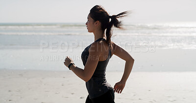 Buy stock photo Fitness, woman and running on beach for training, wellness activity or cardio exercise with space. Girl, runner and workout challenge at ocean for marathon endurance, healthy body and energy in Spain