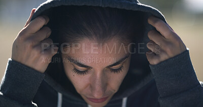 Buy stock photo Woman, runner and outdoor with hoodie for exercise, fitness and health with sportswear in winter. Person, training and workout for wellness with start, ready and prepare for marathon in Australia