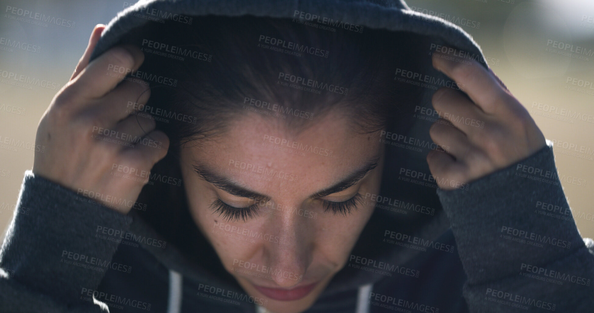 Buy stock photo Woman, runner and outdoor with hoodie for exercise, fitness and health with sportswear in winter. Person, training and workout for wellness with start, ready and prepare for marathon in Australia