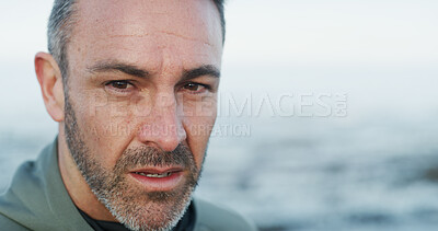 Buy stock photo Fitness, serious man and portrait on beach for exercise, wellness and training. Mature athlete, tired runner and challenge at ocean with workout, physical health and space at California seaside