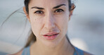 Serious, running and portrait with woman in city for workout break,  fitness and marathon training. Health, exercise and start with person and urban outdoor for wellness, sports and female runner 