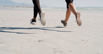 Buy stock photo People, legs and running on beach for fitness, exercise and cardio challenge with speed. Friends, shoes and marathon practice at ocean for fast race, competitive and runners on sea sand with energy