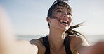 Fitness selfie, woman and happy at beach for exercise vlog, social media post or online workout update. Runner, person and laughing with photography by ocean for training live streaming or sea breeze