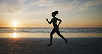 Fitness, woman and running on beach for exercise, wellness and cardio training at sunset space. Girl, runner and speed challenge at ocean for marathon endurance, healthy body and lose weight in Spain