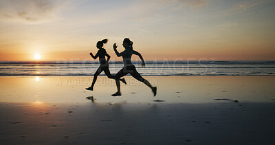 Buy stock photo Fitness, friends or running on beach for exercise, wellness or cardio training at sunset space. Women, runners or speed challenge at ocean for marathon endurance, healthy body or competitive in Spain