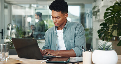 Buy stock photo Man, startup and typing in office with laptop, reading and insight with project at media company. Person, computer and review process with proposal, feedback and notes for report at creative agency