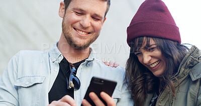 Buy stock photo Couple, phone and smile with travel in city with notification, reading and check booking for taxi on sidewalk. Man, woman and smartphone on mobile app, happy and search for direction on trip in Spain